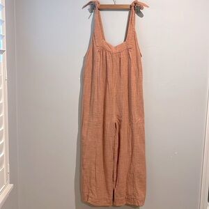 Free People Wide Leg Jumpsuit in Size Small, in Peach Color.